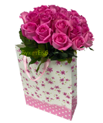 Фото товара «Розовые розы в пакете» №1